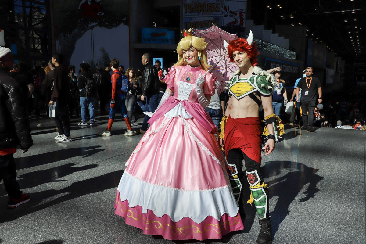 Princess Peach and Bowser cosplayers from Mario universe at the geek convention Trickster Magazine