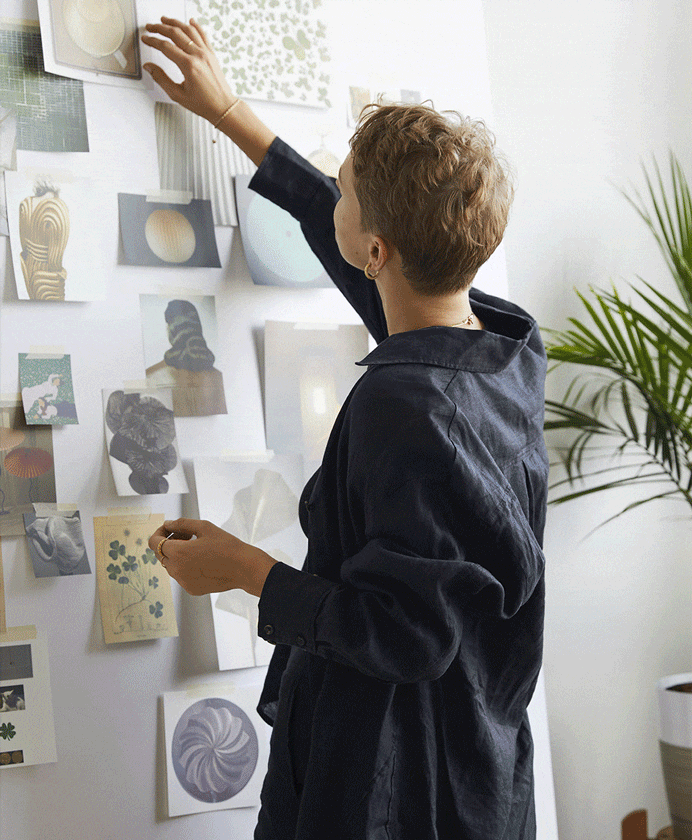 Candid photo of jewelry designer Anni Jürgenson in action for Trickster Magazine